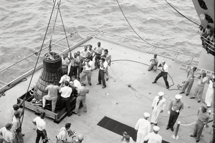 Space History Photo: Cooper and Capsule on Deck